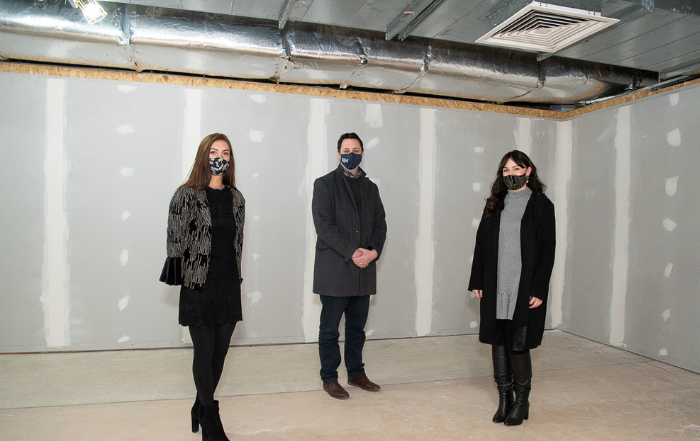 Tees Valley Mayor Ben Houchen with Amber Kotrri, left, and Erin Harper, right, at the under-construction airport store | Darlington Business Club